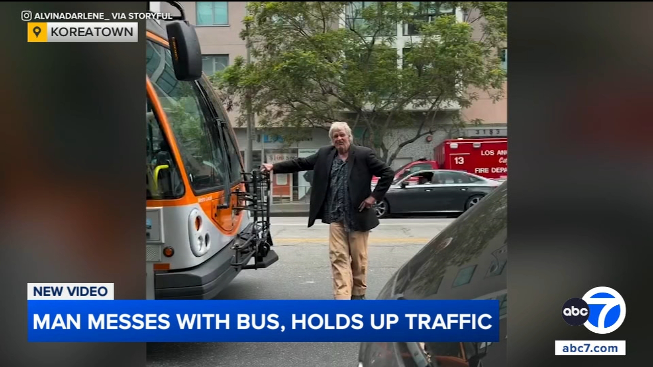 Man stands in front of Metro bus, holds up traffic in Koreatown, video shows