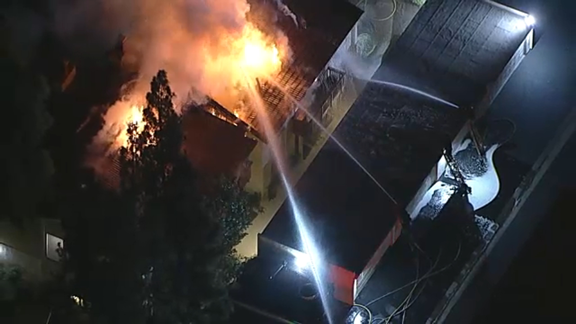 Hourslong barricaded suspect scene escalates to house fire with shots fired in Woodland Hills