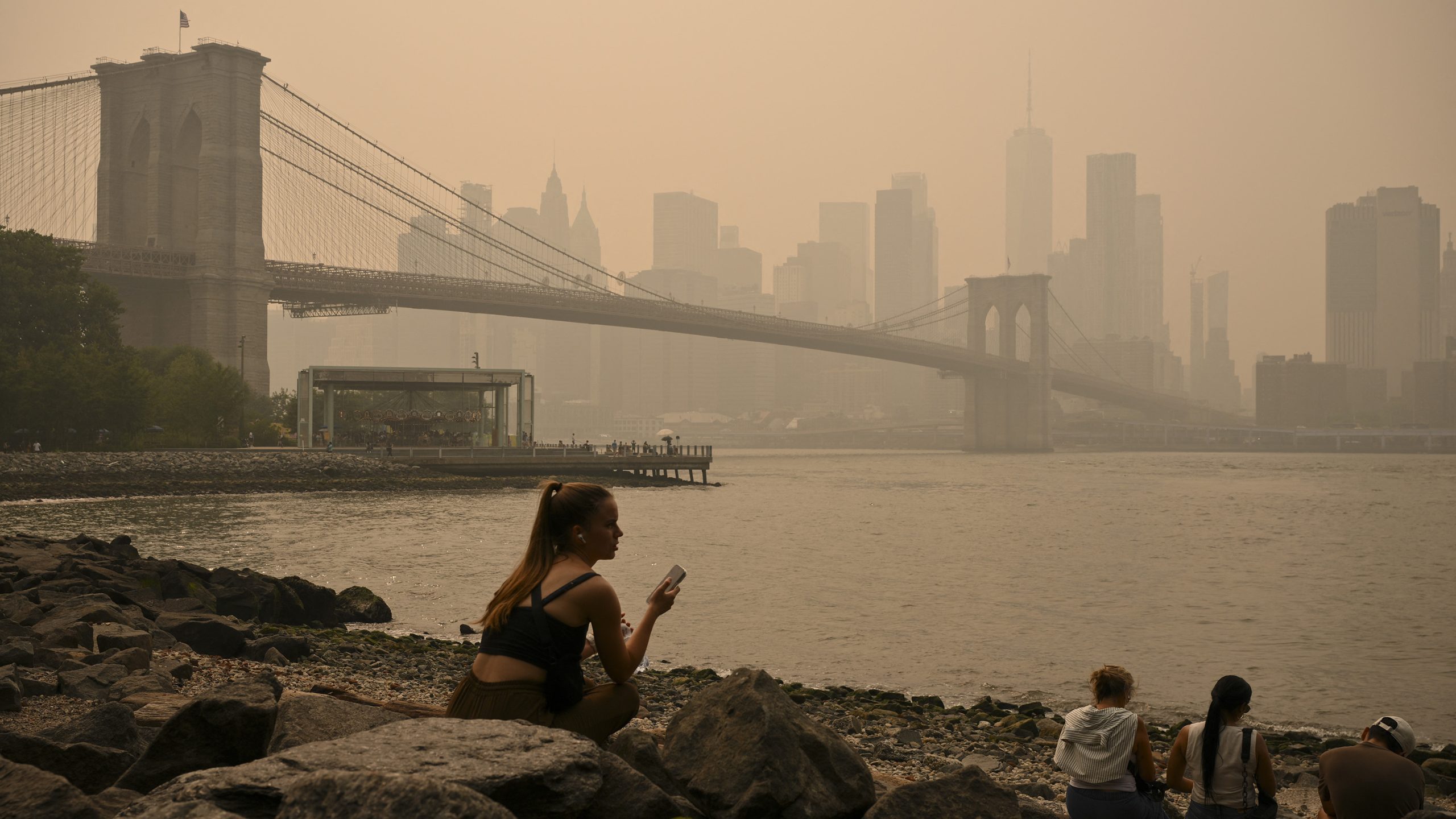Trump blames Canada for wildfire smoke, threatens added tariffs